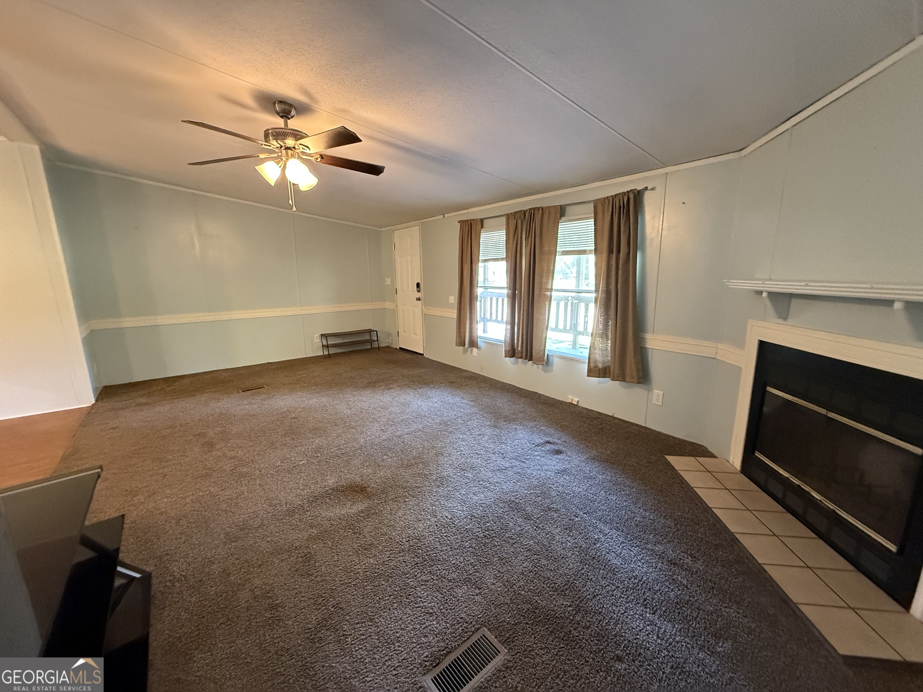 802 Ash Branch Road Pembroke, GA 31321 - Photo 20 of 27 a view of an empty room with a window