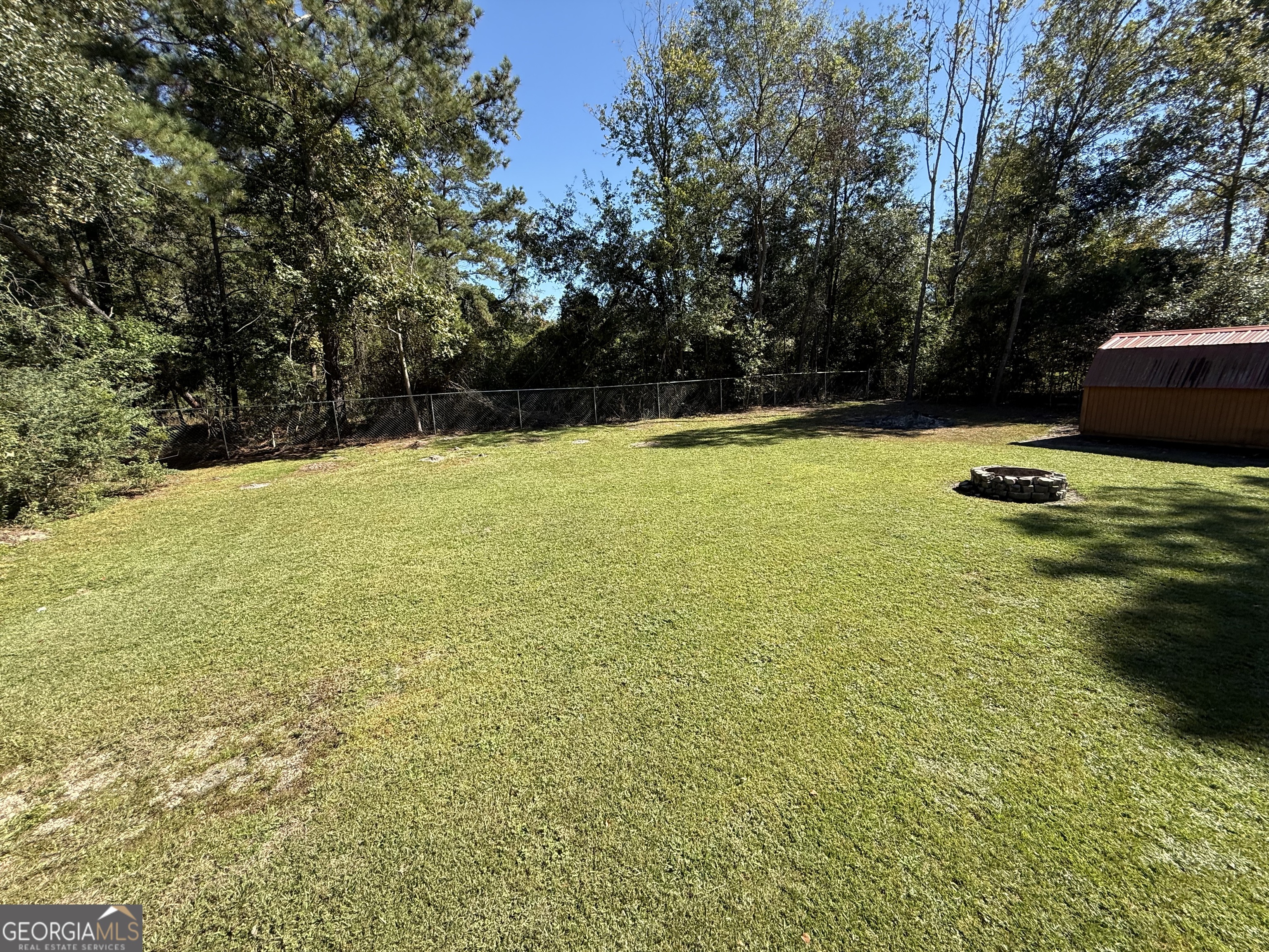 802 Ash Branch Road Pembroke, GA 31321 - Photo 5 of 27 a view of an outdoor space and swimming pool