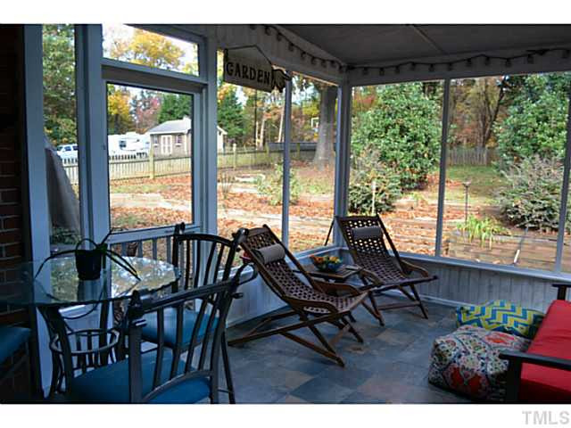 9936 Baileywick Road Raleigh, NC 27613 - Photo 16 of 24 Screened porch to enjoy coffee and overlook the beautiful yard Screened Porch