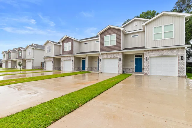 a view of an house with a swimming pool