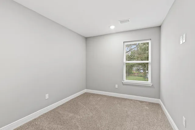 an empty room with a window