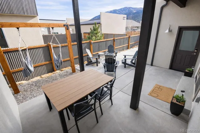 an outdoor space with furniture