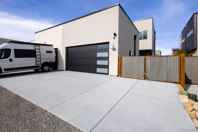 a view of a swimming pool with an outdoor space and seating area