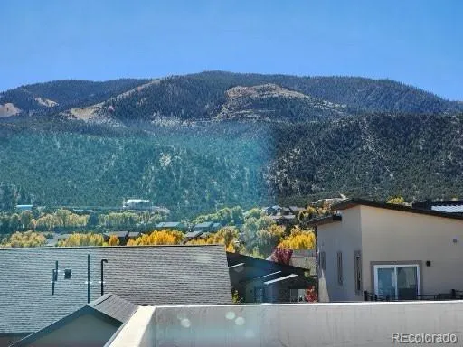 a view of a dry yard with mountain