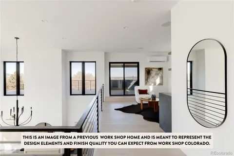 a kitchen with a refrigerator and a sink