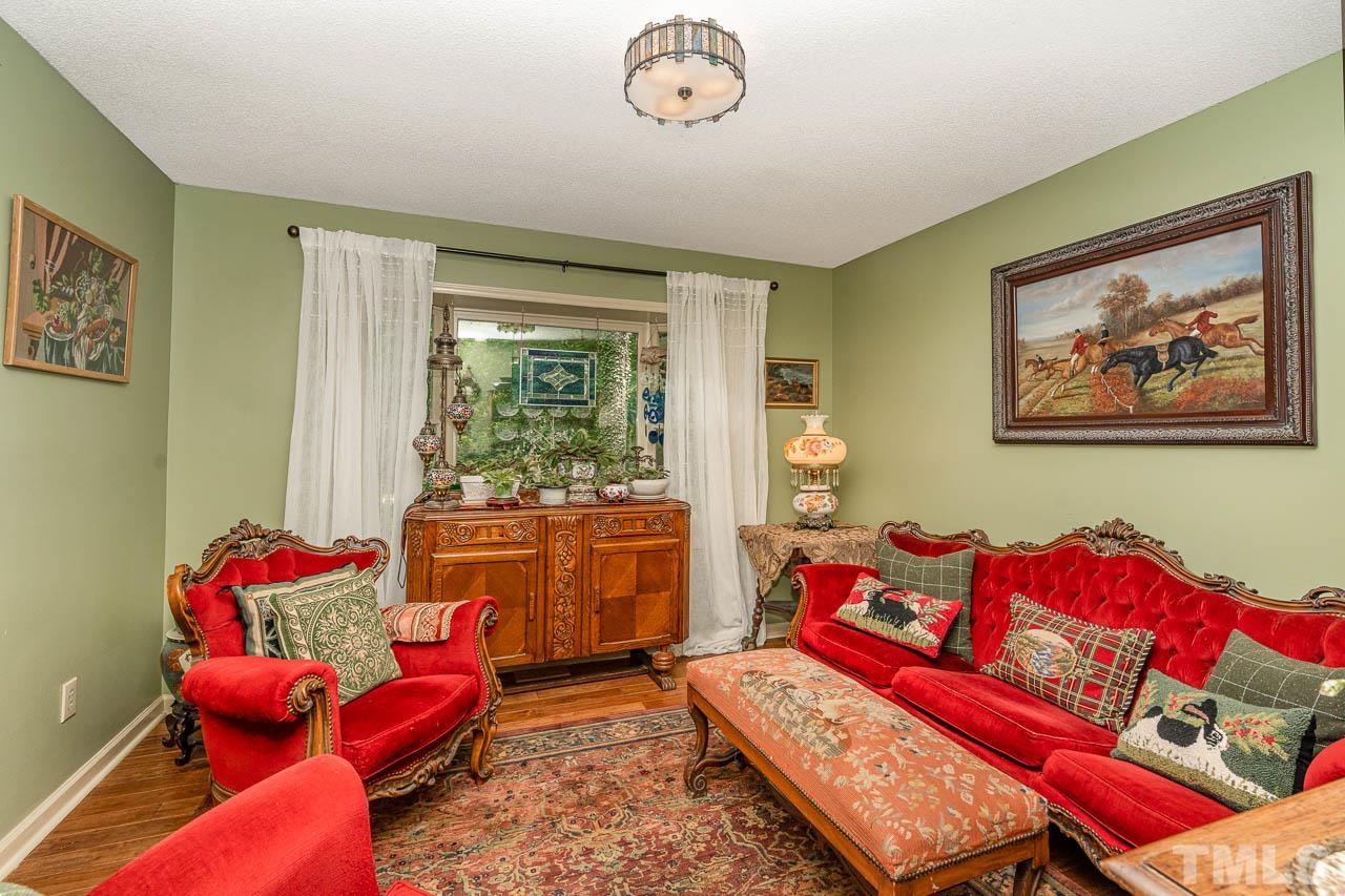 2025 Valley Ridge Court Raleigh, NC 27603 - Photo 23 of 32 a living room with furniture and a window