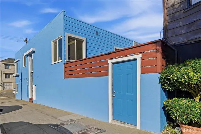 a living room with furniture a window and a table