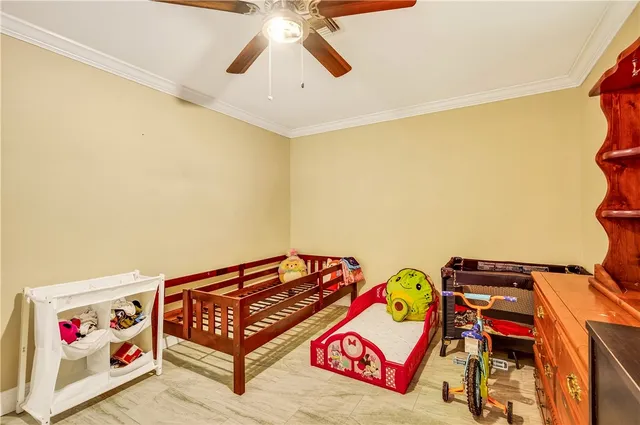 a living room with a bed and couch