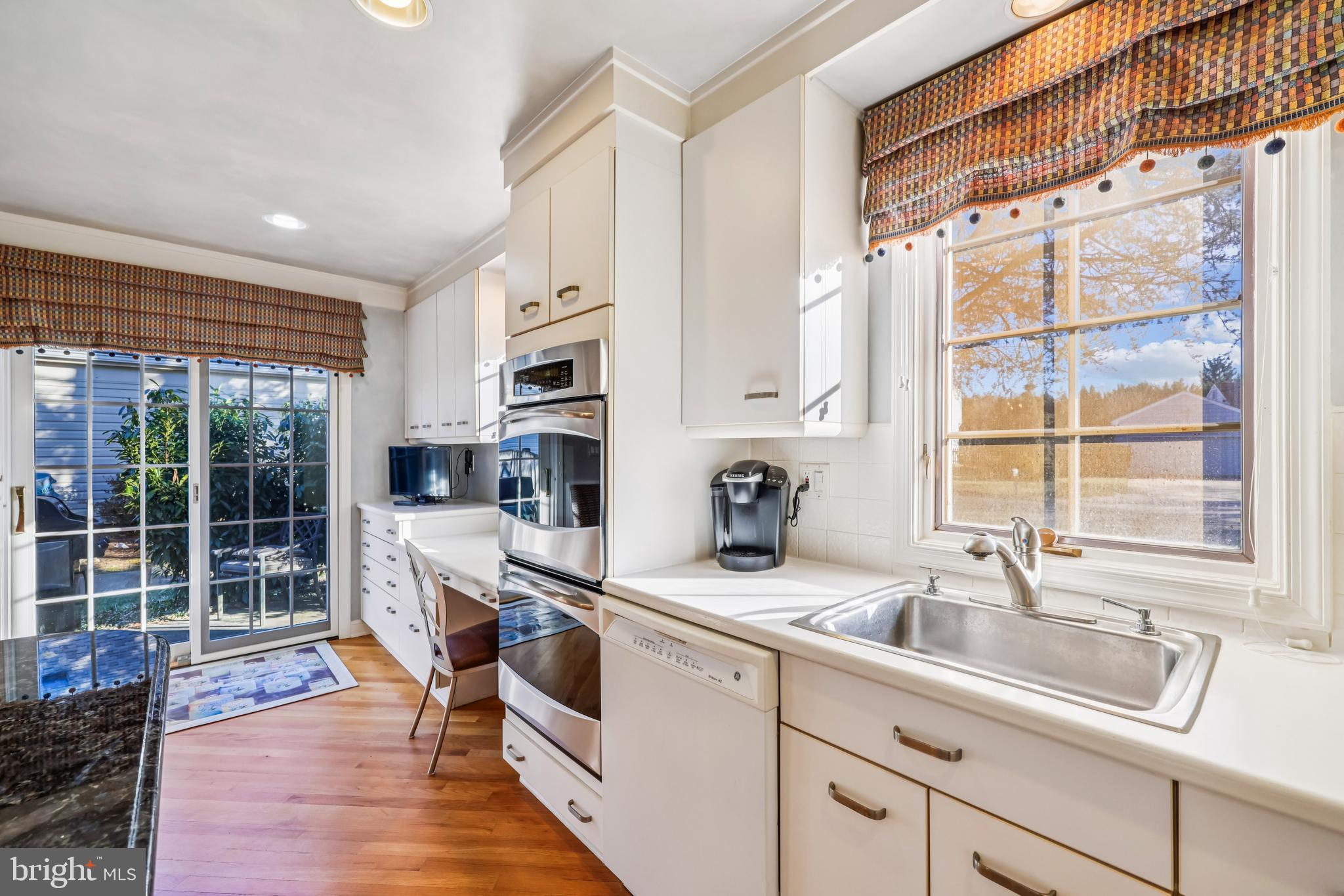 9025 Paddock Lane Potomac, MD 20854 - Photo 12 of 69 White Cabinets and Countertops