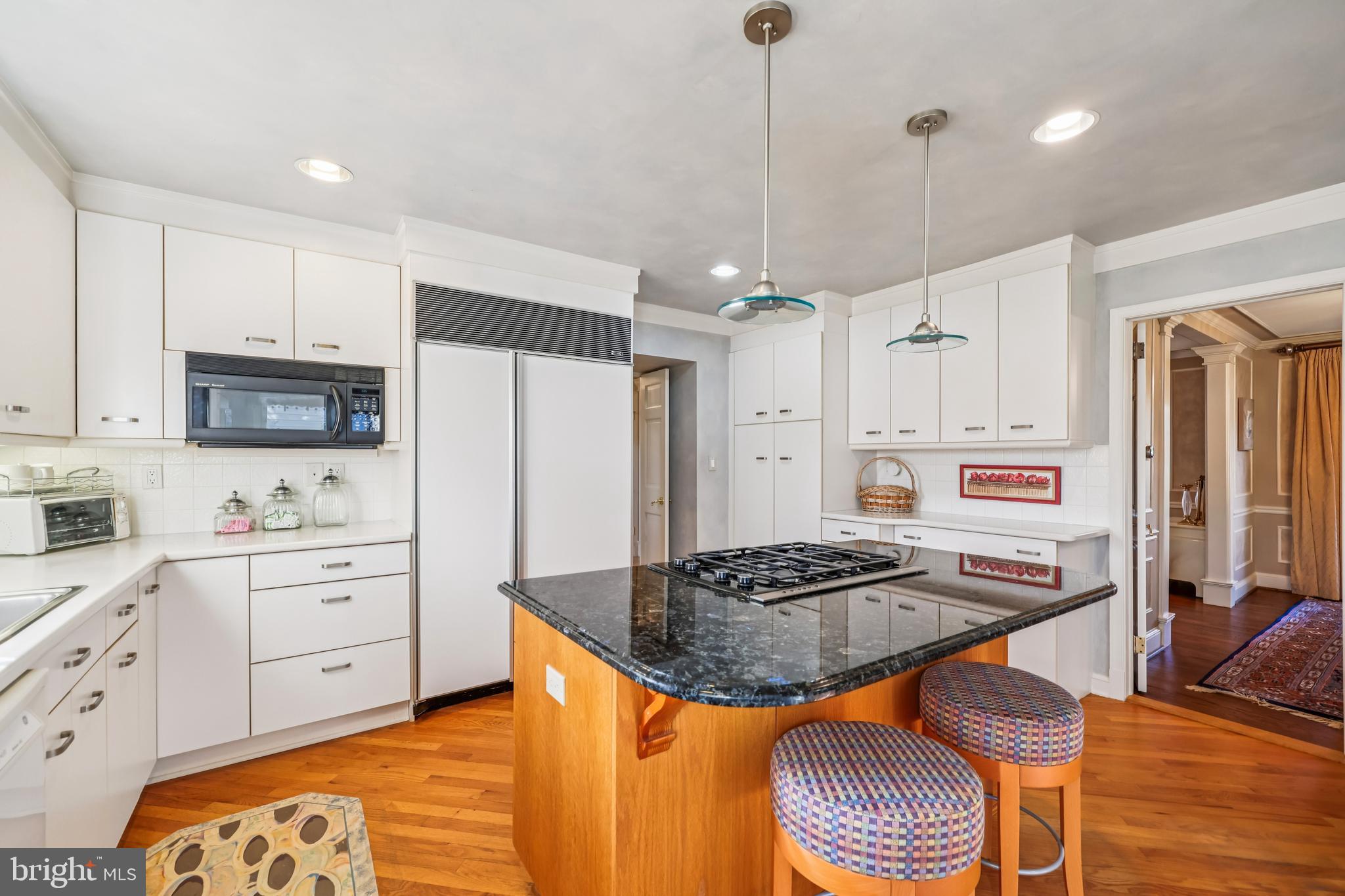 9025 Paddock Lane Potomac, MD 20854 - Photo 16 of 69 Island with Gas Cooktop