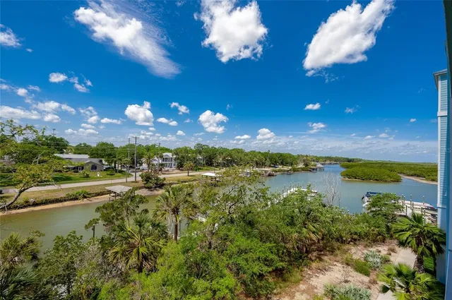 a bathroom with a sink and mirror with toilet