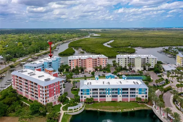 a view of a swimming pool with a yard