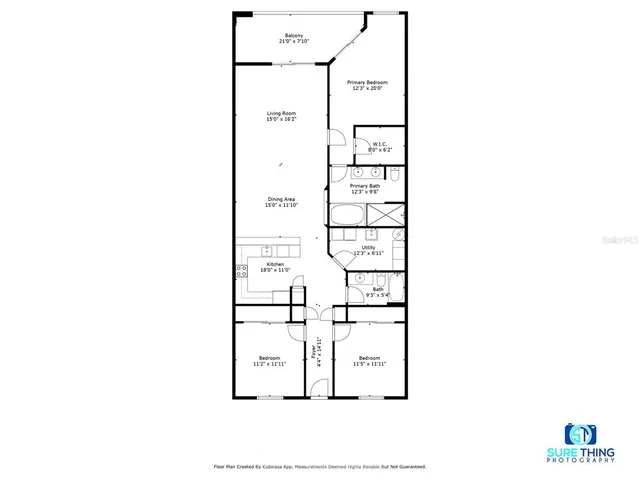 a kitchen with a refrigerator sink and microwave