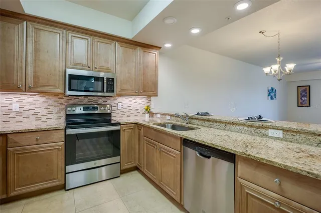 a dining room with a table and chairs