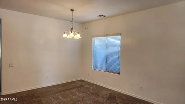 a view of room with racks on the wall