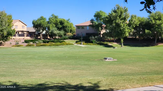 a view of wooden floor and a building