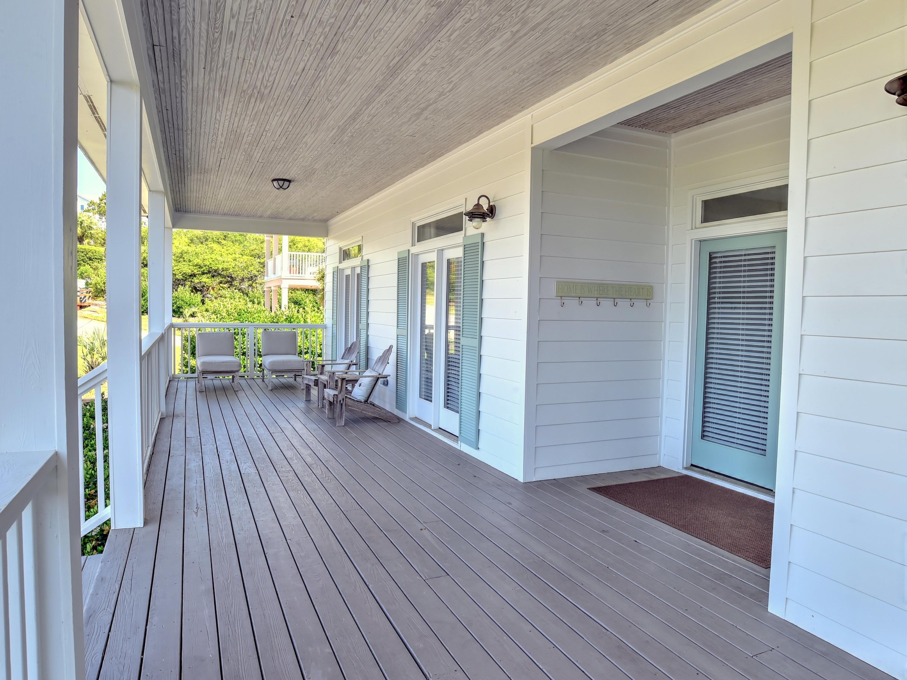 16 Bullard Road Santa Rosa Beach, FL 32459 - Photo 8 of 55 a view of outdoor living room with furniture and wooden floor