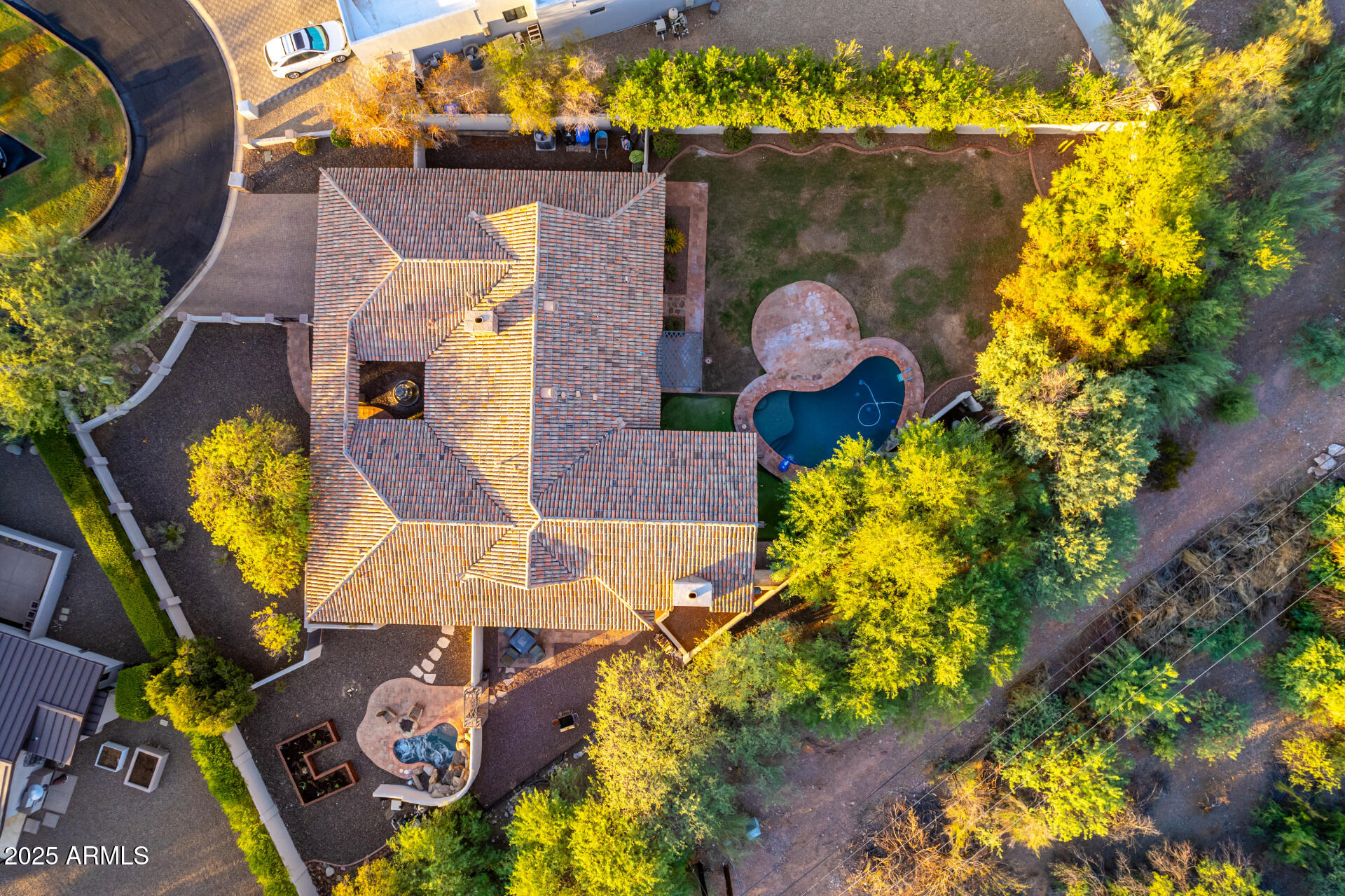 5803 North 45th Street Phoenix, AZ 85018 - Photo 12 of 72 an aerial view of a house with a yard and a large tree