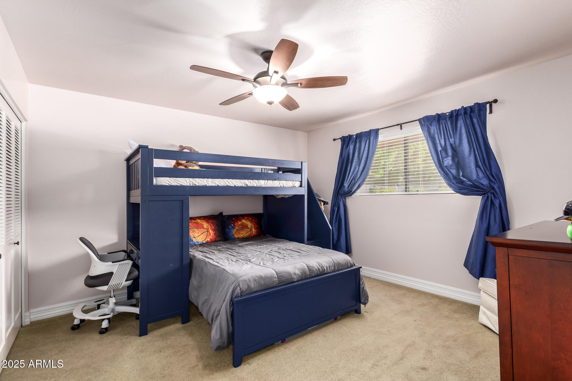 5803 North 45th Street Phoenix, AZ 85018 - Photo 33 of 72 a bedroom with a bed and a ceiling fan
