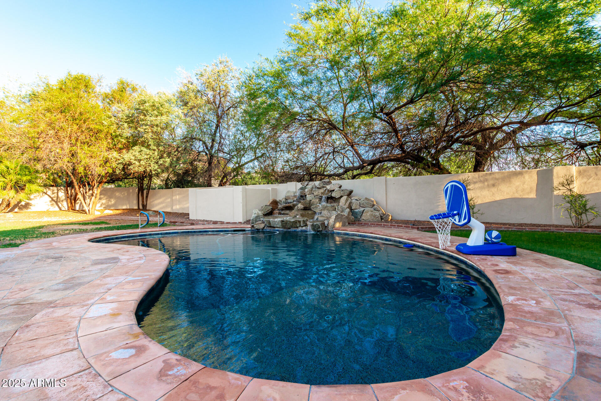 5803 North 45th Street Phoenix, AZ 85018 - Photo 42 of 72 a view of a swimming pool with an outdoor space