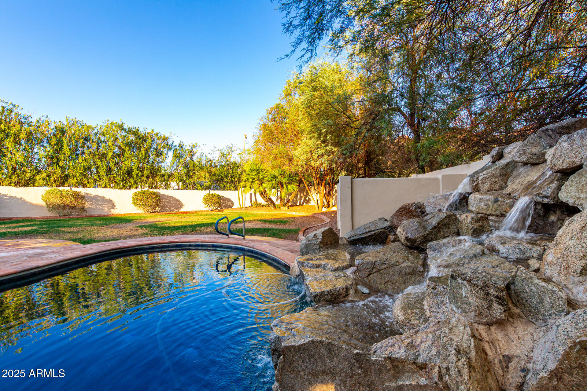 5803 North 45th Street Phoenix, AZ 85018 - Photo 43 of 72 a view of a swimming pool with a patio