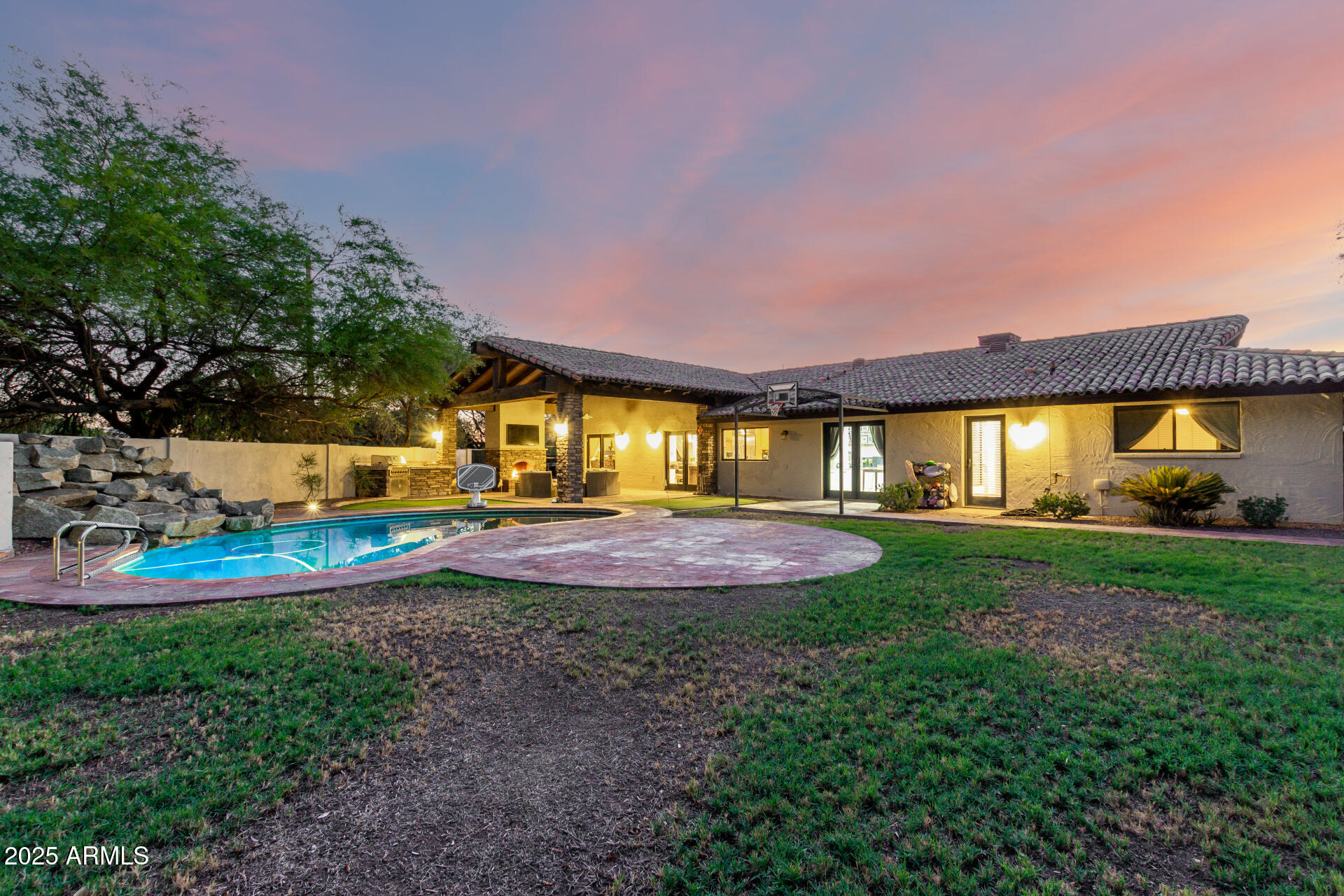 5803 North 45th Street Phoenix, AZ 85018 - Photo 47 of 72 a view of yard with swimming pool and outdoor seating
