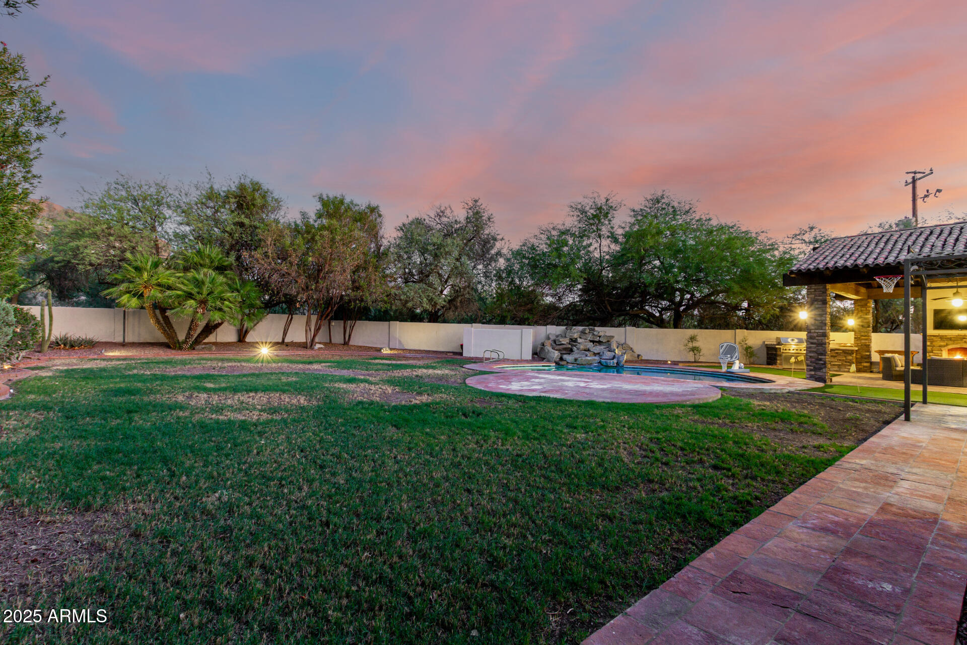 5803 North 45th Street Phoenix, AZ 85018 - Photo 48 of 72 a front view of a house with a yard