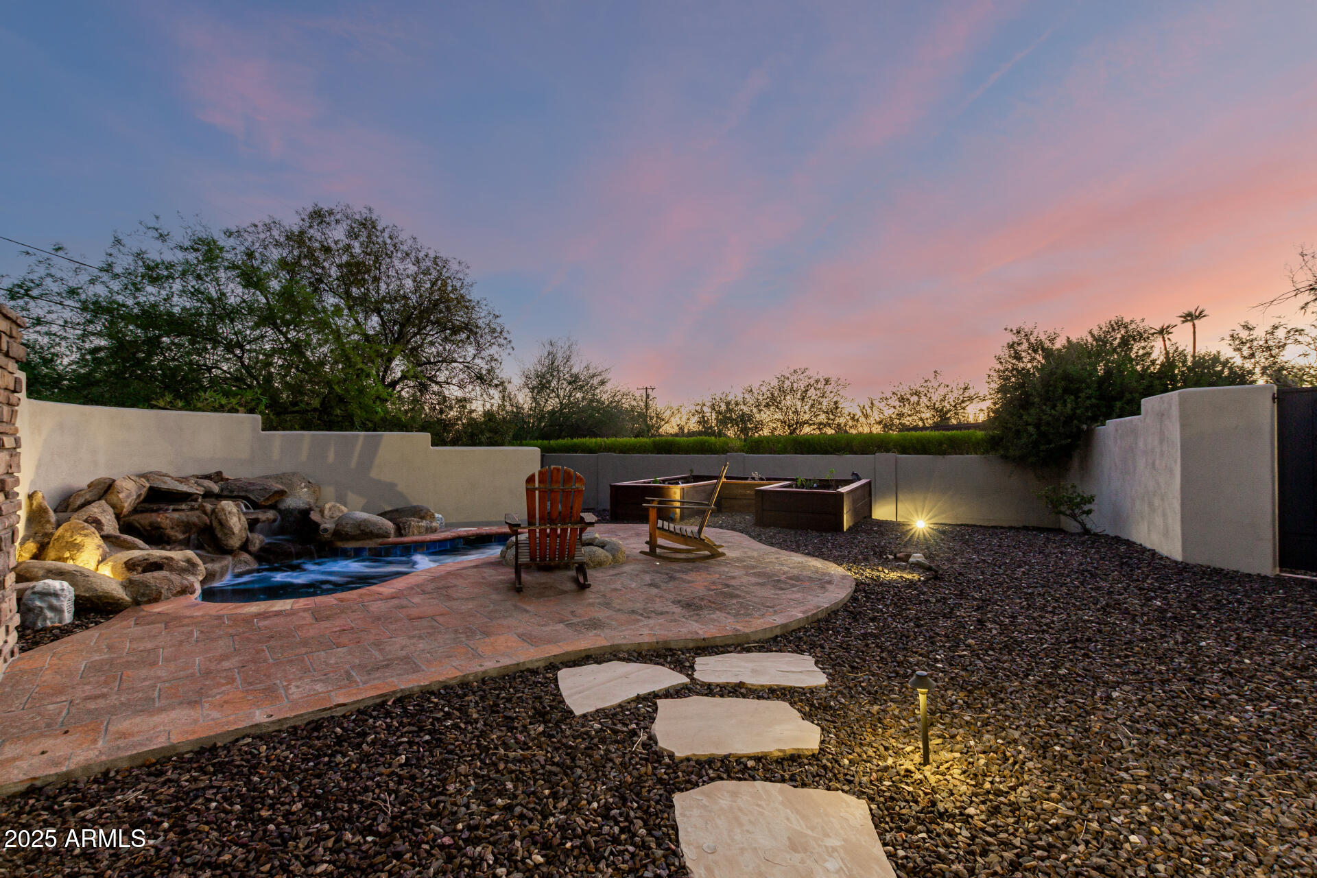 5803 North 45th Street Phoenix, AZ 85018 - Photo 52 of 72 a backyard of a house with table and chairs