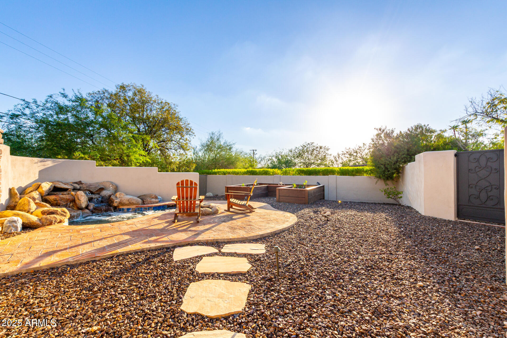 5803 North 45th Street Phoenix, AZ 85018 - Photo 55 of 72 a view of a backyard with a patio and swimming pool