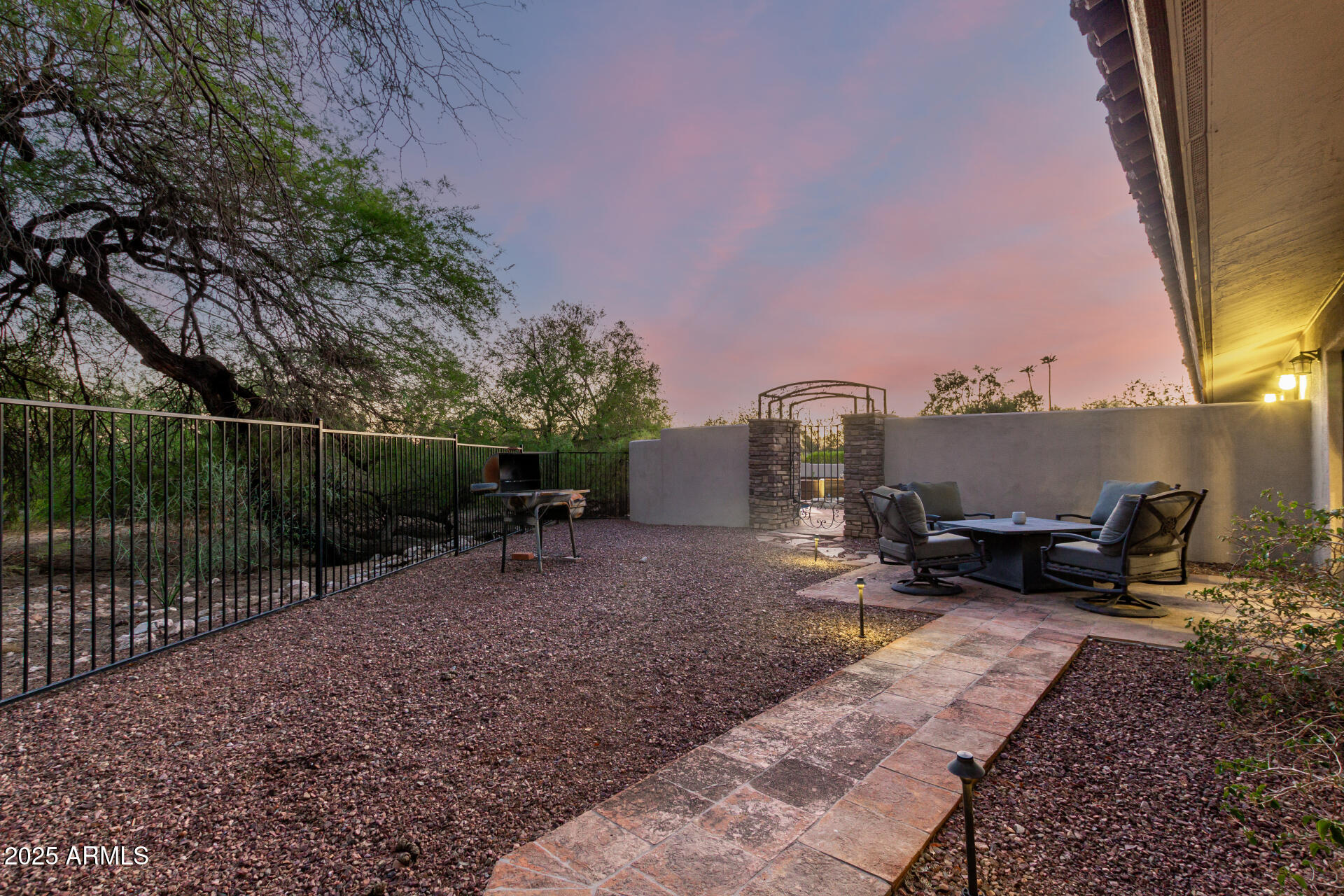 5803 North 45th Street Phoenix, AZ 85018 - Photo 60 of 72 a view of a backyard with sitting area and furniture
