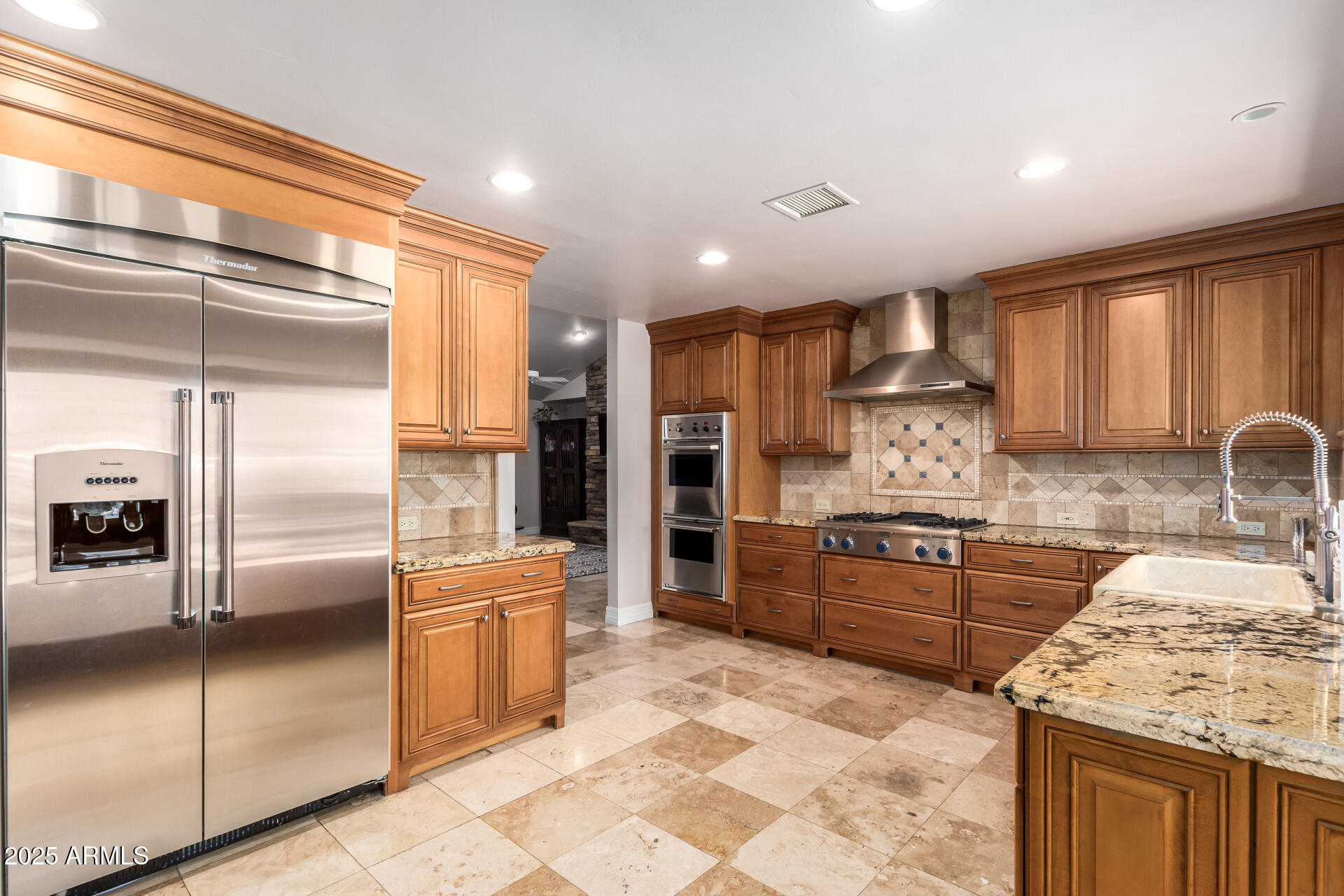 5803 North 45th Street Phoenix, AZ 85018 - Photo 8 of 72 a kitchen with stainless steel appliances granite countertop a refrigerator a stove and a sink