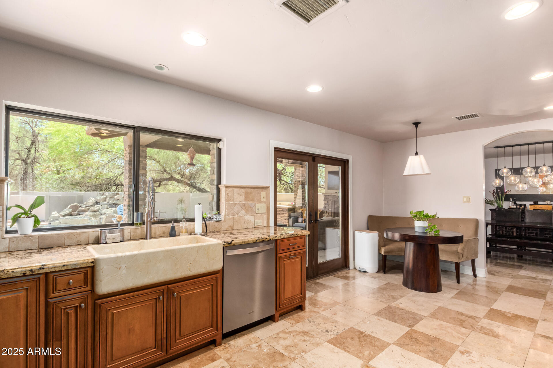 5803 North 45th Street Phoenix, AZ 85018 - Photo 9 of 72 a kitchen with a sink and counter top space