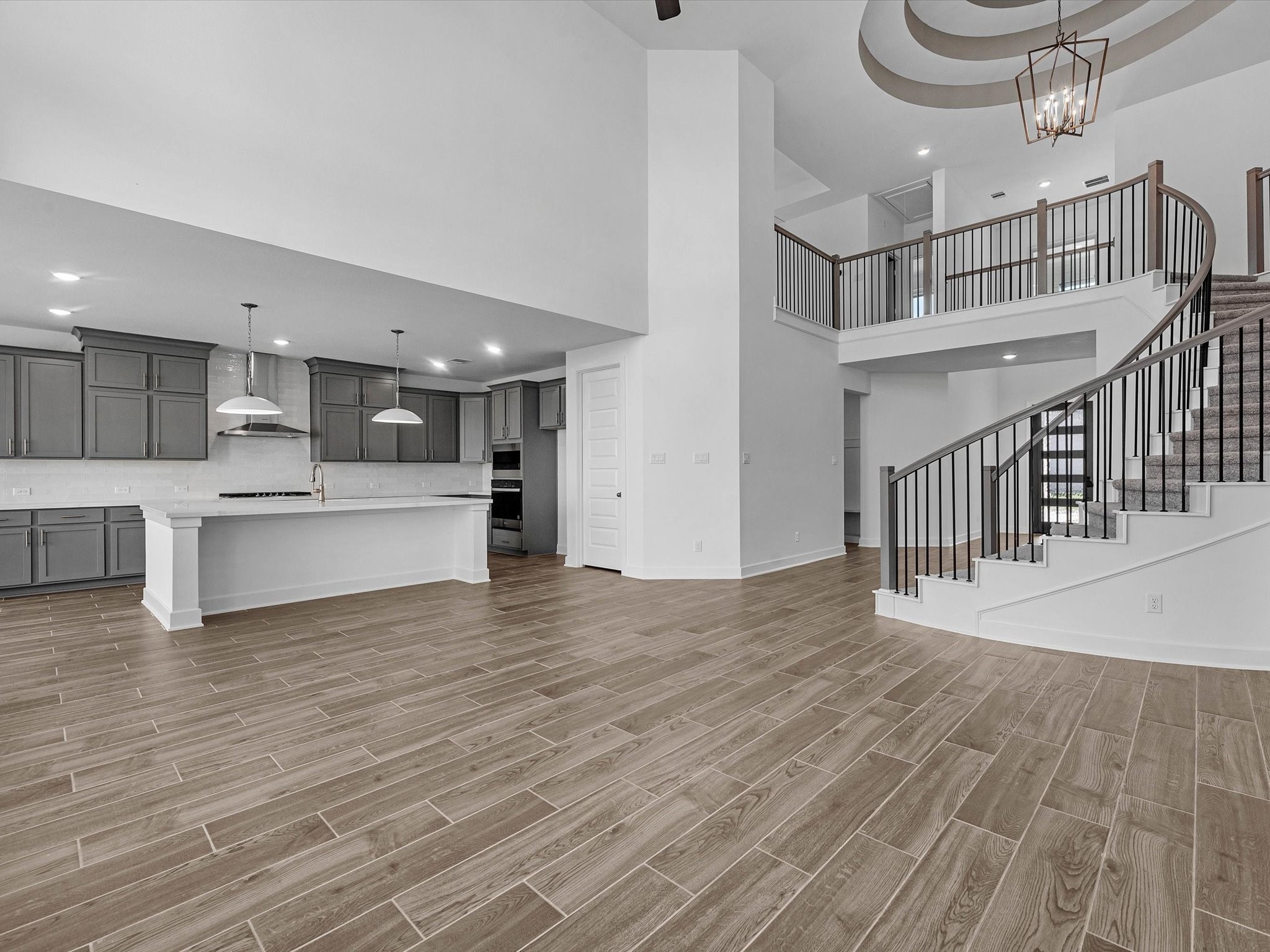 9118 Colonnade Way Manvel, TX 77578 - Photo 6 of 31 a view of kitchen with furniture and wooden floor