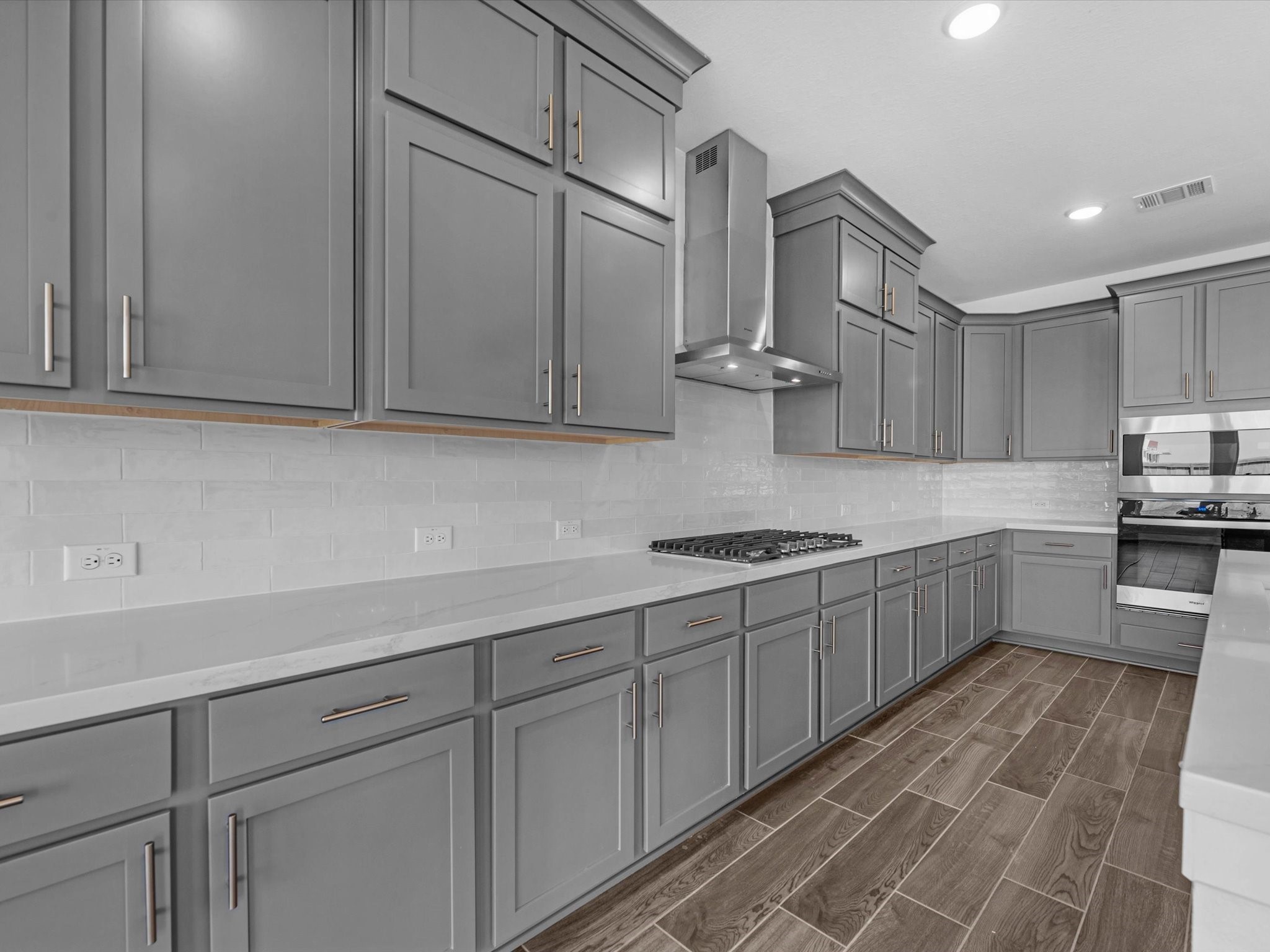 9118 Colonnade Way Manvel, TX 77578 - Photo 9 of 31 a kitchen with stainless steel appliances granite countertop a sink stove and cabinets