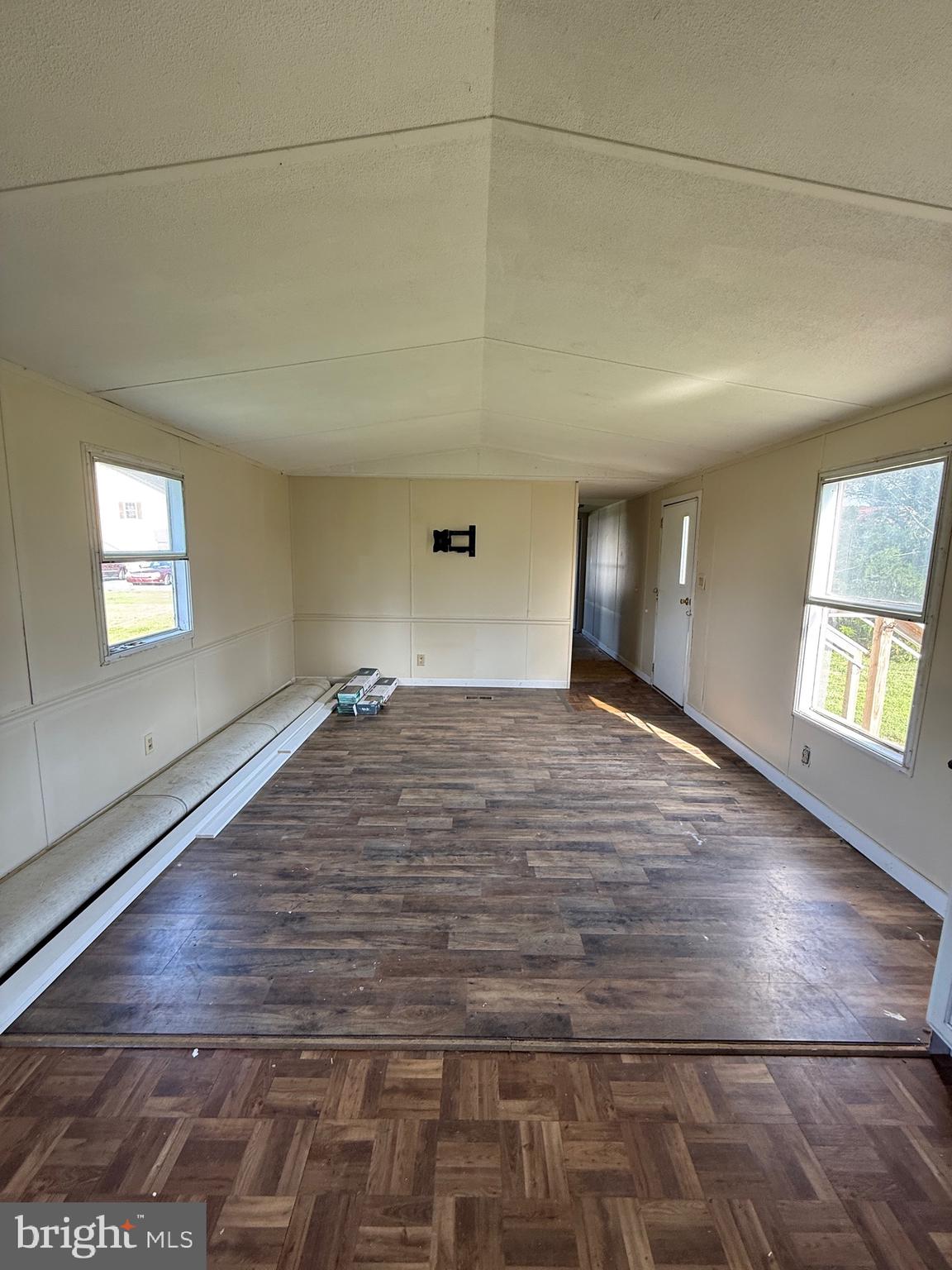 16 Abbotts Pond Road Greenwood, DE 19950 - Photo 19 of 19 a view of empty room with window and wooden floor