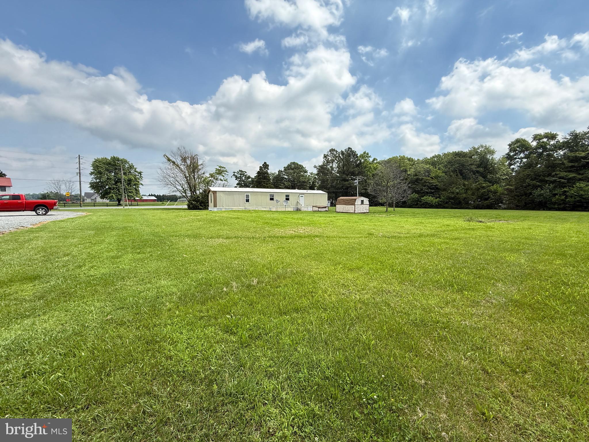 16 Abbotts Pond Road Greenwood, DE 19950 - Photo 2 of 19 a view of an outdoor space and yard
