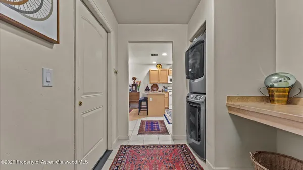 a hallway with a view of bedroom
