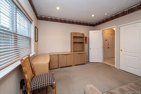 a view of a livingroom with furniture