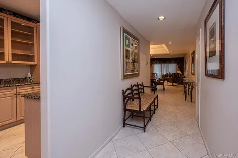 a view of a entryway with furniture and floor to ceiling window