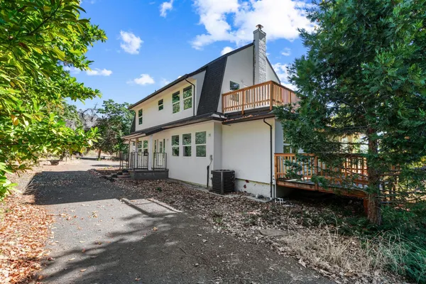 a view of house with outdoor space