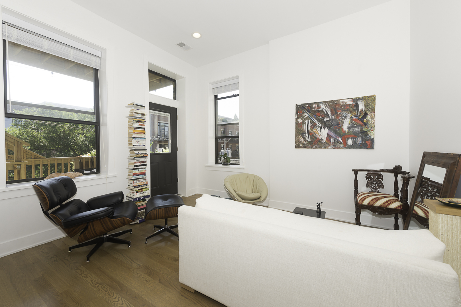 3517 North Reta Avenue, Unit 3R Chicago, IL 60657 - Photo 5 of 9 a bedroom with a bed and wooden floor