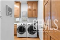 Undisclosed Address Tehachapi, CA 93561 - Photo 20 of 39 a view of a hallway with washer and dryer