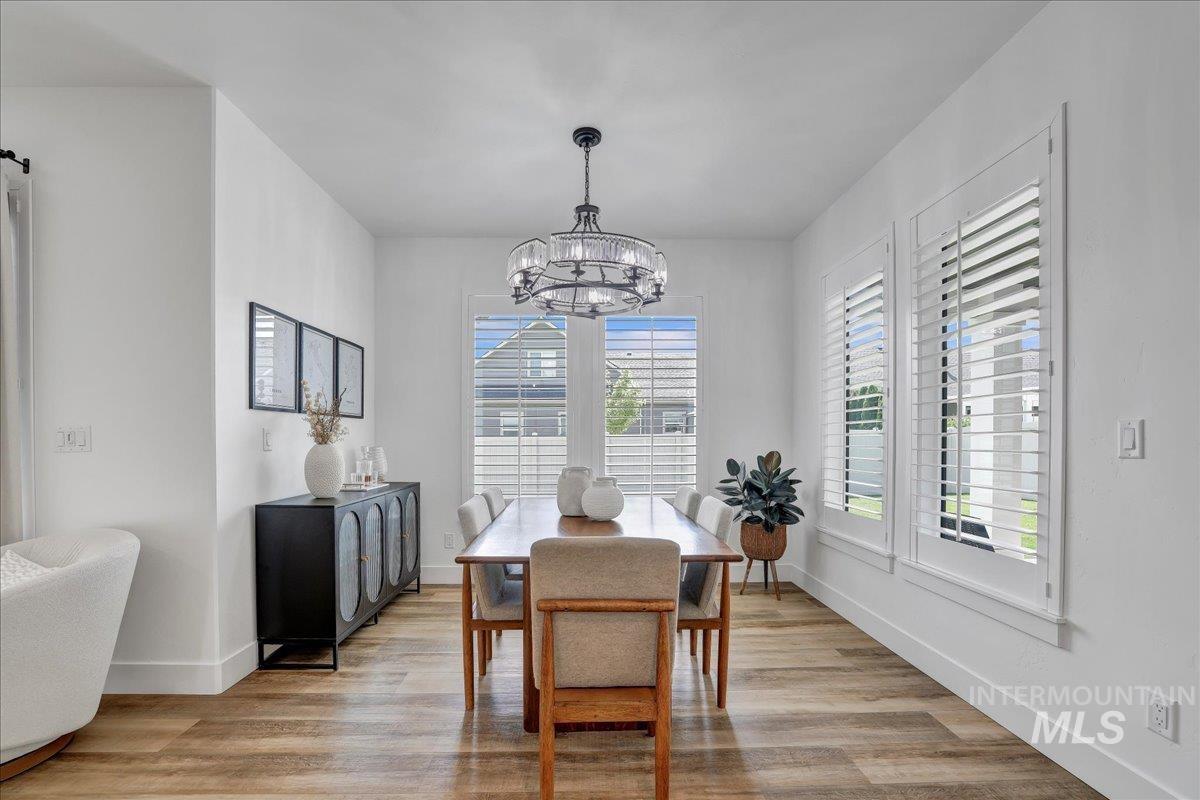 2078 Red Rock Way Twin Falls, ID 83301 - Photo 14 of 49 Dining room featuring a chandelier and light wood finished floors