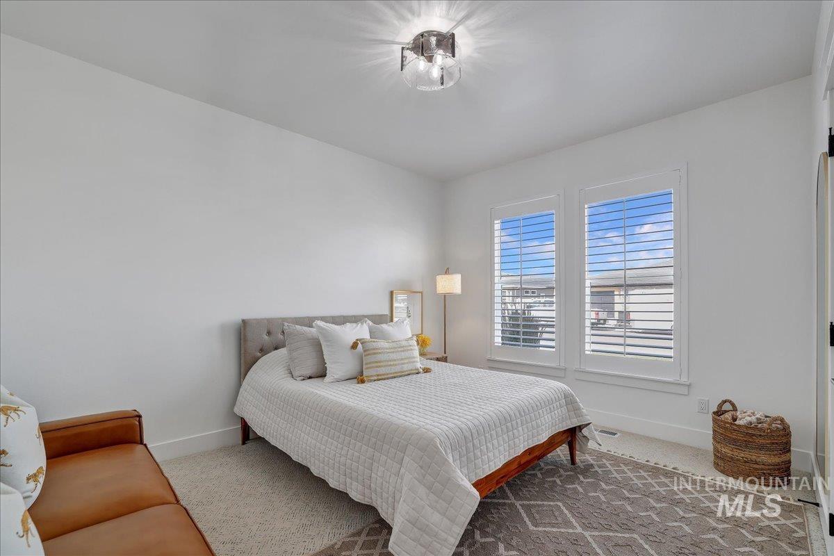 2078 Red Rock Way Twin Falls, ID 83301 - Photo 15 of 49 Bedroom featuring baseboards and carpet flooring