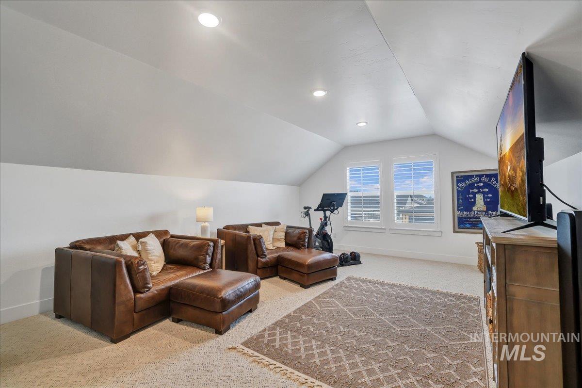 2078 Red Rock Way Twin Falls, ID 83301 - Photo 35 of 49 Living room featuring carpet, lofted ceiling, and recessed lighting