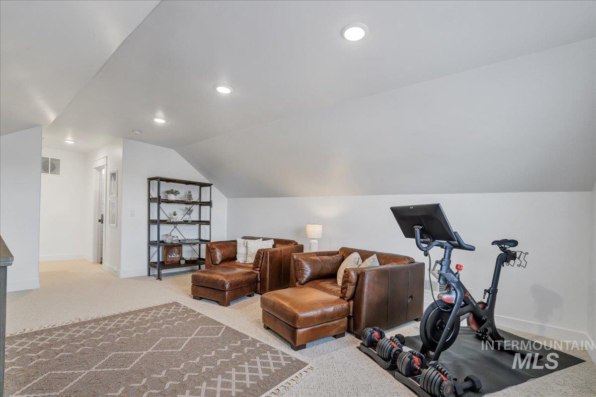 2078 Red Rock Way Twin Falls, ID 83301 - Photo 36 of 49 Exercise room featuring carpet floors, vaulted ceiling, and recessed lighting