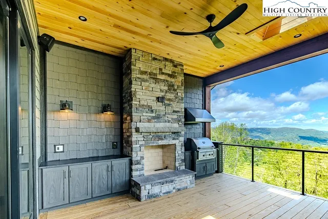 a view of a fireplace with wooden floor