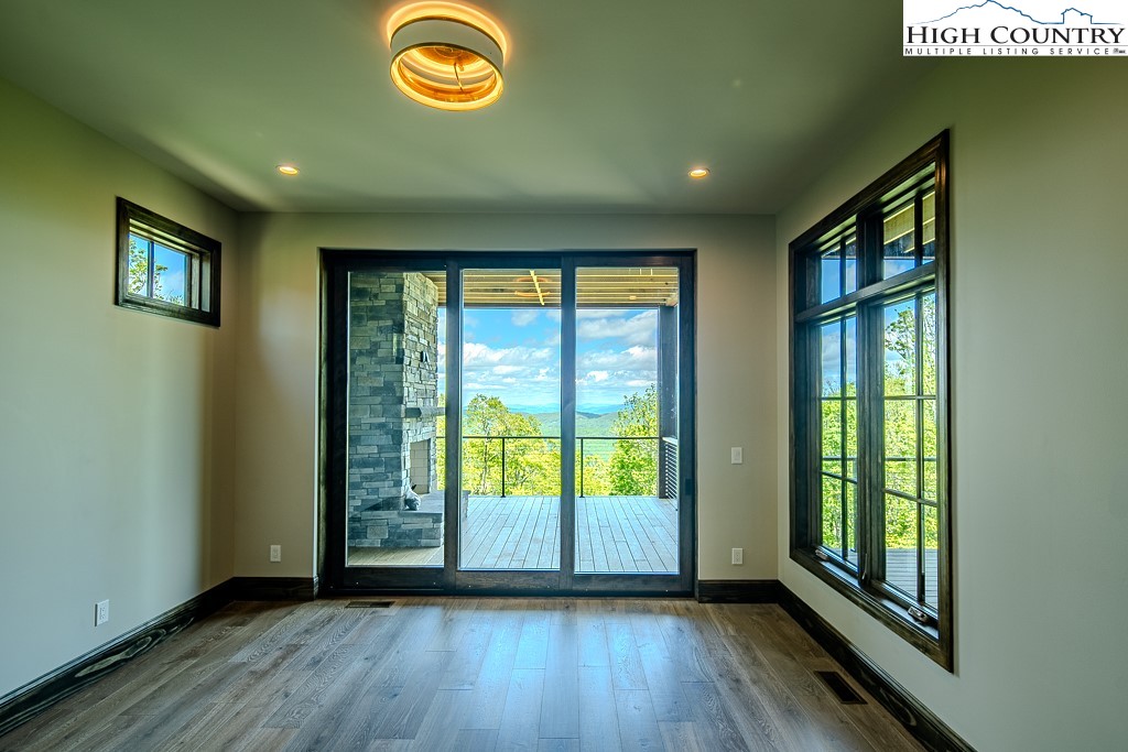 2005 Moon Run Linville, NC 28646 - Photo 33 of 37 a view of empty room with wooden floor and fan
