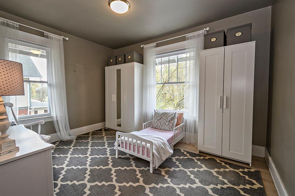 1623 Ridge Avenue Coraopolis, PA 15108 - Photo 20 of 25 Second bedroom has overhead lighting and new windows. (please note this room does not have a closet; seller uses wardrobes for storage)