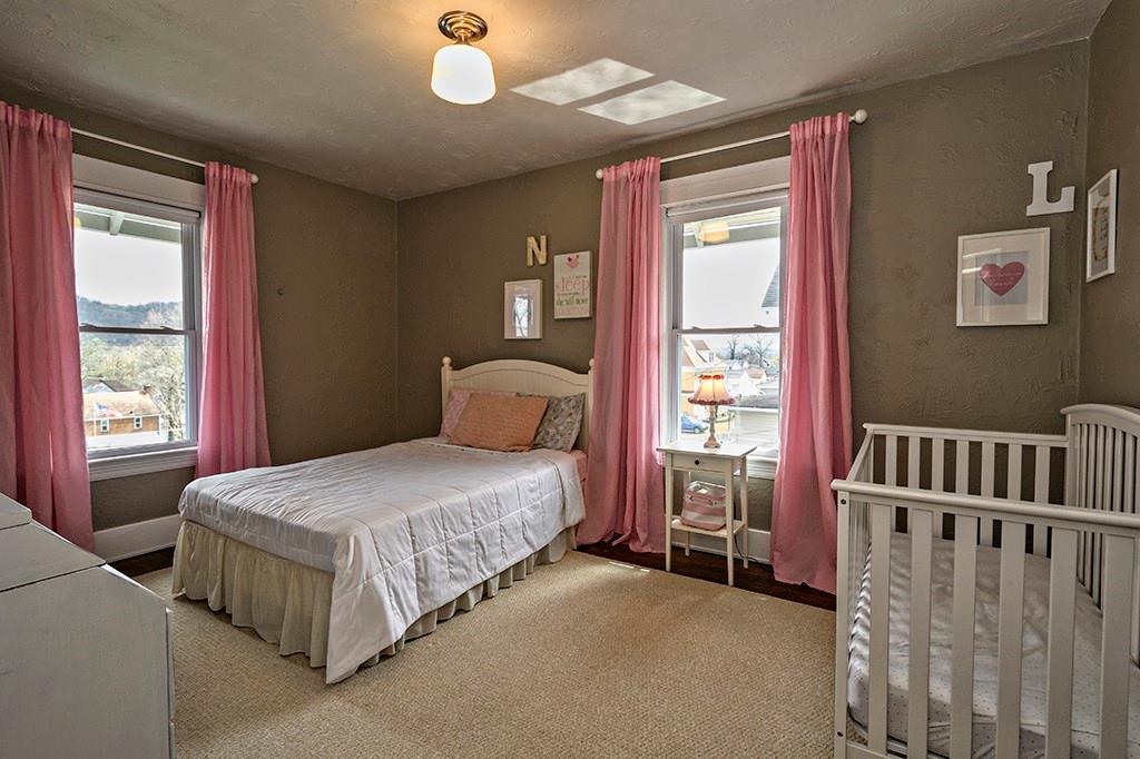 1623 Ridge Avenue Coraopolis, PA 15108 - Photo 21 of 25 Third bedroom is just as large as the others. It too has overhead lighting and new windows.